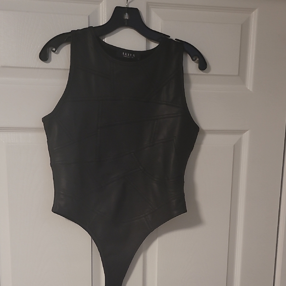 AKIRA Sleek Black Patch Work Style Bodysuit